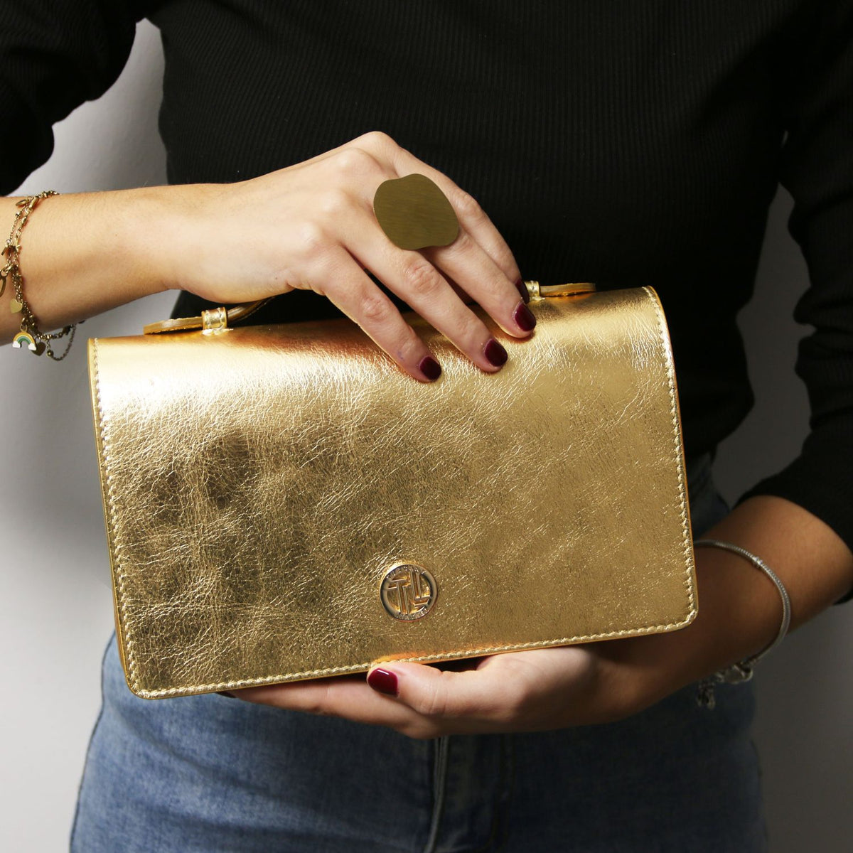 Opera - metallic leather clutch bag with chain