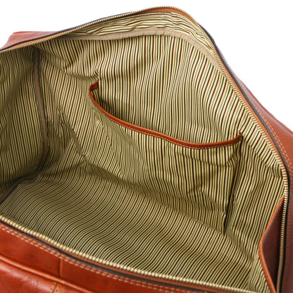 TL Voyager - leather travel bag with a front pocket